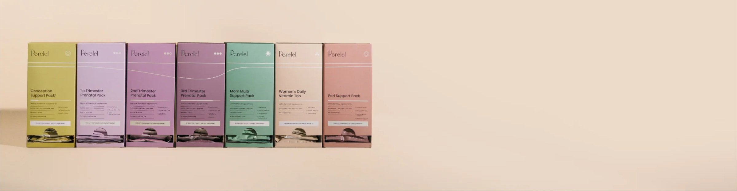 A row of Perelel vitamin pack boxes in pastel colors, one for each stage